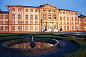 Bruchsal Castle with fountain, illuminated at night, Bruchsal, Baden-WÃ¼rttemberg, Germany