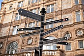 Pedestrian signposts in Soho, London, England