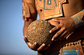 A Mayan ball player holds up the ball made of hule, natural rubber, in Chapab village in Yucatan state in Mexico´s Yucatan peninsula, June 14, 2009