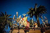 A sculpture of Jesus riding a donkey is carried during a religious procession during the palm sunday in the town of Prado del Rey in southern Spain´s Cadiz Sierra region in Andalucia, March 28, 2010  Easter processions in Andalucia during Holy Week are a