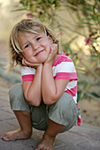 Little girl smiling at camera, Vienna, Austria