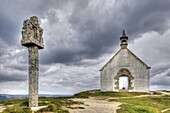 France, Brittany, Carnac, Tumulus Saint Michel, Saint Michel chapel and the carved cross of Christ