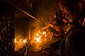 Myanmar (Burma), Môn State, Kyaiktiyo, Golden Rock, with the paya Shwedagon of Yangon and the paya Mahamuni of Mandalay, this Buddhsit site is one of the most revered in Myanmar, when night comes pilgrims keep on chanting psalms, light candles and meditat