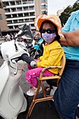 Vietnam,Vietnam,Ho Chi Minh City,Motorbike Passengers Wearing Pollution Masks