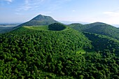 France, Puy de Dome (63), the Puy de Dome volcano is 1465 meters, of the Puys, labeled Grand Site de France, at the forefront of the Puy Pariou (aerial view)