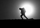 Hiker on Mountain Ridge, Silhouette, Grizzly Peak, Colorado, USA