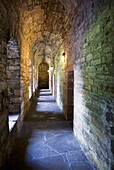 Cloister in the Earl's Palace. A 17th century palace interior, a narrow cloister and small keyhole arch., Cloister of the Earl's Palace, in Kirkwall town in Orkney.