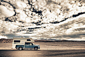 Truck camper in desert, Death Valley National Park, Death Valley, California, USA, Death Valley National Park, California, USA