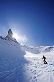 Woman backcountry skiing, ascending towards Kleiner Turm, Drei Tuerme, Raetikon, Montafon, Vorarlberg, Austria
