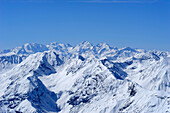 View towards the mountains of the Swiss National Park with Piz Quattervals and Bernina range in background, Swiss National Park, Engadin, Grisons, Switzerland