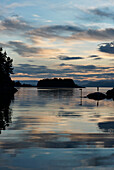 Port Exit in Kolbeinshamn in the evening light, Island of Huftaroy, Austevoll, Norway