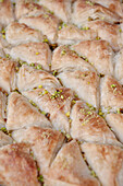 Sweet puff pastry covered with pistachio, capital Amman, Jordan, Middle East, Asia