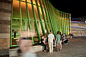 Young people in front of national gallery Stuttgart at night, Baden-Wuerttemberg, Germany, Europe