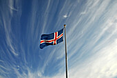Flag of Iceland under clouded sky, Iceland, Europe