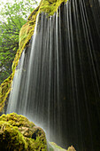 Water running over a moss-covered rock face, Schleierfall, Schleier waterfall, Ammer, Pfaffenwinkel, Garmisch, Upper Bavaria, Bavaria, Germany