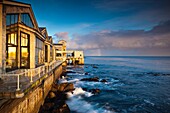 USA, California, Central Coast, Monterey, residential buildings along Monterey Bay, dawn