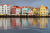 Curaçao, Netherlands Antilles, Dutch, Willemstad, Punda, St  Sint Anna Bay, Handelskade, waterfront, UNESCO World Heritage Site, colonial architecture, building, preservation, restoration, pastel color, harbor, water reflection