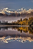 Lake Matheson dawn reflection, Mt Tasman left and Aoraki / Mt Cook, near Fox Glacier, Westland National Park , West Coast