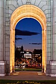 Night time view towards the Gran Via in Madrid through The historic Puerta de Alcalá  monument