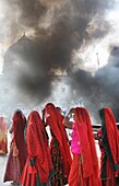 India, Rajasthan, Mukam, Jambeshwar festival, Bishnoi women going round the Havan or holy fire