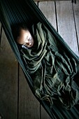 Longneck baby sleeping in a hammock Approximately 300 Burmese refugees in Thailand are members of the indigenous group known as the Longnecks The largest of the three villages where the Longnecks live is called Nai Soi, located near Mae Hong Son City Long