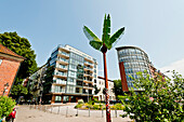 Artificial palm tree and houses, St. Pauli, Hamburg, Germany, Europe