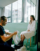 Woman having a footbath in a spa, Langenlois, Lower Austria, Austria