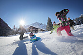 Children playing in snow, Gargellen, Montafon, Vorarlberg, Austria