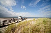 Pier ´Seebruecke´ and the baltic beach of the coastal resort of Lubmin, Mecklenburg-Vorpommern, Germany