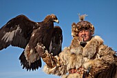 Kazak eagle hunters from far western province of Bayan Olgii compete in winter festival, Mongolia