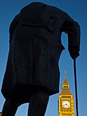 England, Greater London, City of Westminster  Churchill statue and the iconic Big Ben also known as the Clock Tower, part of the House of Parliament building also known as the Palace of Westminster, located in the City of Westminster, London