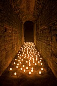 subway of the Kaiserthermen, illuminated with candles, Trier, Germany