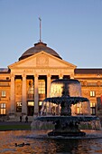 Kurhaus and fountain in sunset light, Wiesbaden, Hesse, Germany