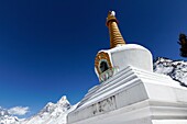 Buddhist stupa at Tengboche monastery with the mountain of Ama Dablam behind it, Everest Region, Nepal