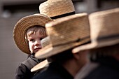 Amish boy during the Annual Mud Sale to support the Fire Department in Gordonville, PA