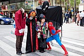 Japan,Tokyo,Ginza,Shoppers Posing with Halloween Costumed Characters
