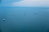 Cargo ships and oil tankers in the Chesapeake Bay of Virginia. Global trade. Elevated view.
