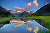 Dammastock reflecting in a mountain lake, Dammastock, Urner Alps, Uri, Switzerland