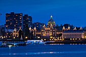 Canada, British Columbia, Vancouver Island, Victoria, Inner Harbour view towards the British Columbia Parliament Building, dusk