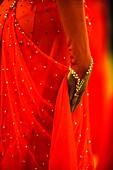 Close up of a red dress and a female hand at a dancing competition, Germany, Europe