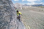 Rock climbing a route called Conceptual Reality which is rated 5,9 and located on The Gallstone at The City Of Rocks National Reserve near the town of Almo in southern Idaho