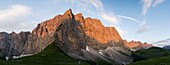 Karwendel Mountain Range between Spritzkar Spitze and Birkkar Spitze, Austria, during sunrise  The sheer north faces of the Laliderer Waende on the right are milestones in the alpine climbing history  The Karwendel limestone mountain range is the largest.