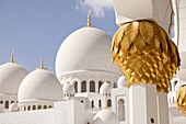 golden ornaments and white domes of Sheikh Zayed Mosque in Abu Dhabi, United Arab Emirates, Asia