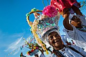 Baiana women carry religious figurines during the ritual procession in honor to Yemanjá, the Candomblé goddess of the sea, in Amoreiras, Bahia, Brazil, 3 February 2012  Yemanjá, originally from the ancient Yoruba mythology, is one of the most popular ‘ori