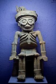 A sculpture of God of Death sitting in his throne is displayed at the Rufino Tamayo pre-Hispanic art museum in Oaxaca, Mexico.