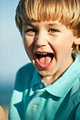 Portrait of Blond Boy Laughing - Pompano Beach, Florida USA