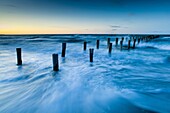 Decayed wooden jetty, Beach of Zingst, Baltic Sea, Germany