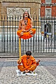 Meditating in Plaza Mayor, Madrid, Spain