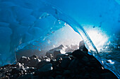 View of the entrance of an ice cave in Mendenhall Glacier, Juneau, Southeast Alaska, Summer