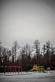 Desolate Playground on Gray Winter Day